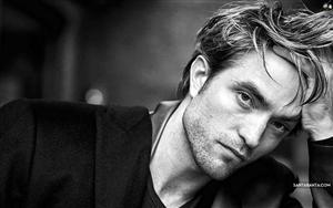 A black and white image of Robert Pattinson - the new Batman actor